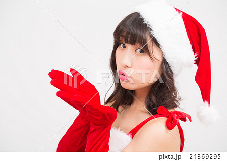 投げキッス セクシー 投げキス 笑顔 クリスマスの写真素材