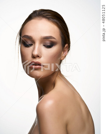 A beautiful young woman with very large natural - Stock Photo [78096796]  - PIXTA