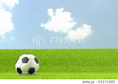 サッカーボール 芝生の写真素材