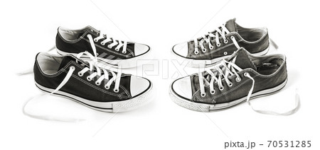 New And Old Black Sneakers Isolated On White の写真素材