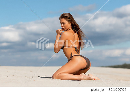 Naked women in panties hugging on beach - Stock Photo [81729889