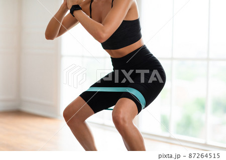 Strong vitality athletic woman doing yoga workout for balance at