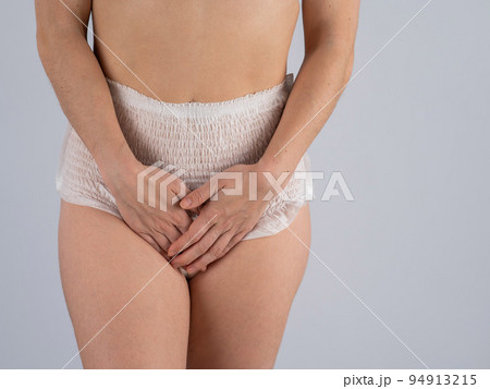 The woman is wearing adult diapers. Urinary incontinence problem