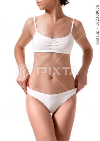 Free Photo  Belly and hips. slim tanned woman's body isolated on